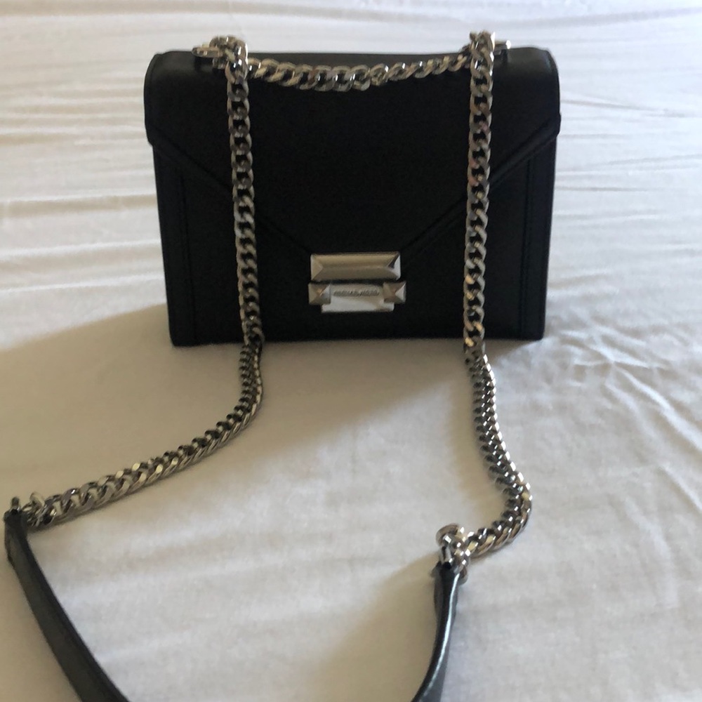 Black leather MK crossbody purse.